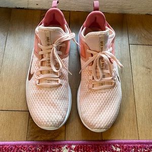 Light pink Nike tennis shoes! Gently worn and little wear to them! Size 8.5